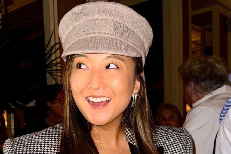 Ashley Park enjoys Paris in a Ruslan Baginskiy cap